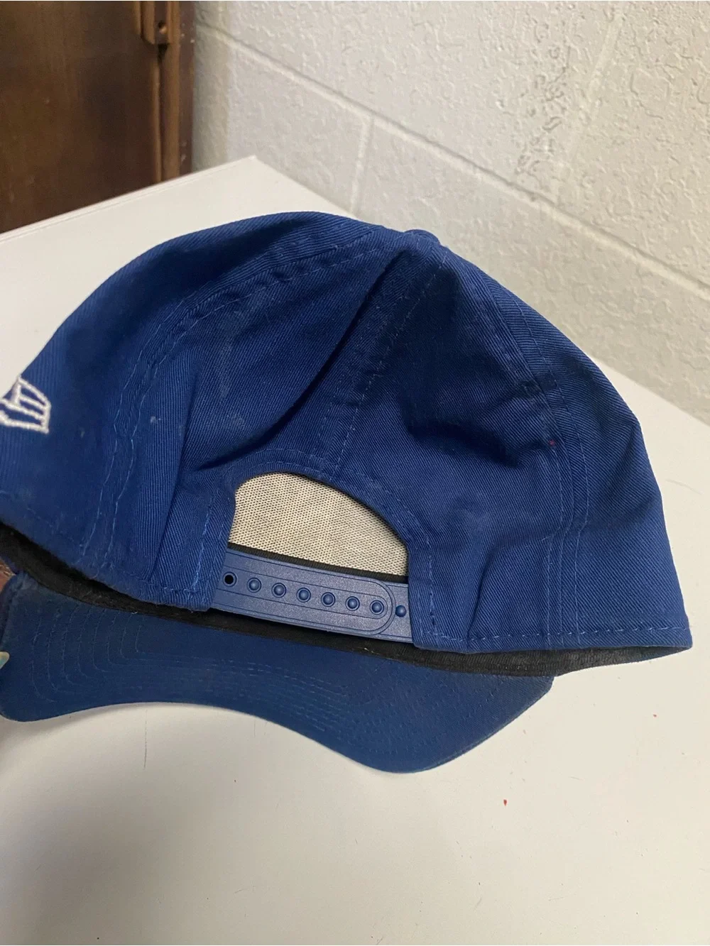 New Era Blue Snapback Cap with Black Sweatband